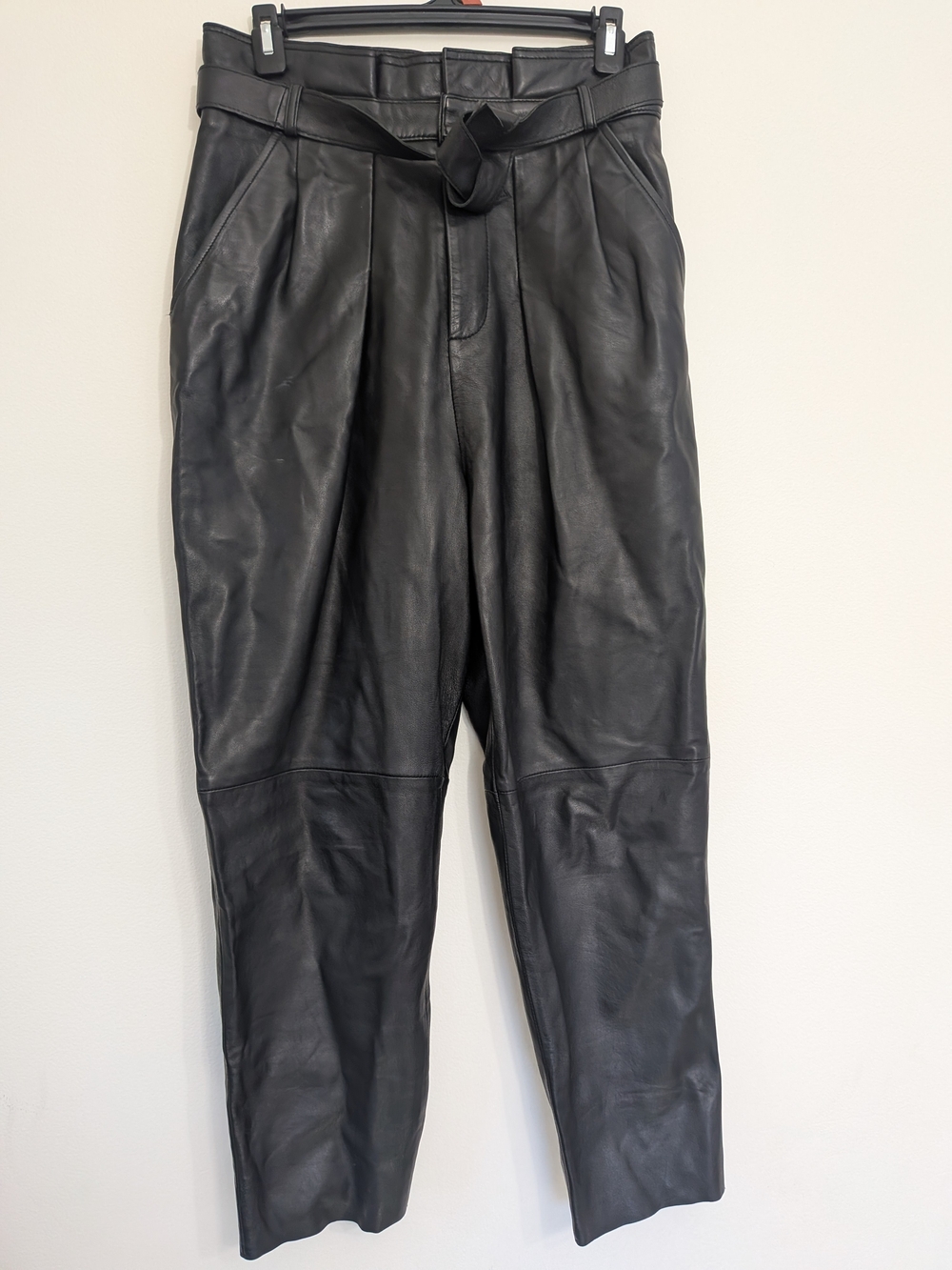 Lux Maximalism, Black High-Waist Belted 100% Lamb Leather Paperbag Pants.